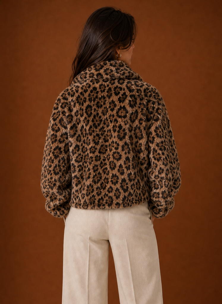 Back view of the animal-print faux fur jacket showing full pattern coverage