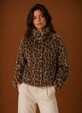 Front view of a women's animal-print faux fur jacket on a mannequin