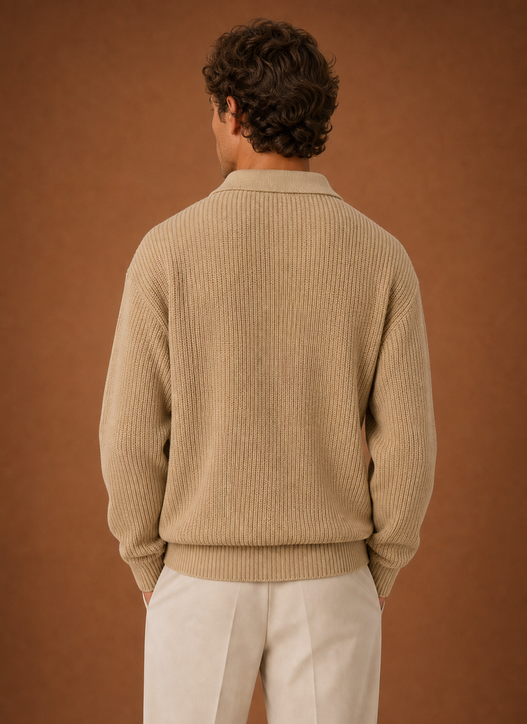 Back view of the oversized quarter-zip knit sweater with a clean knit finish