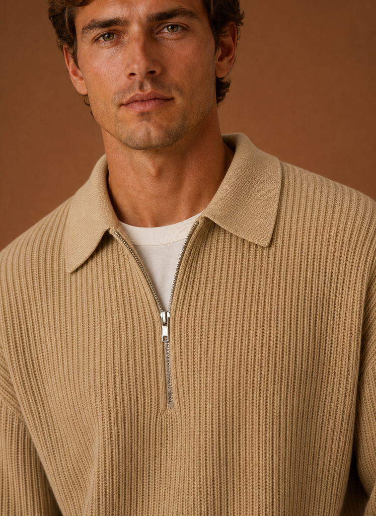 Close-up of the quarter-zip neckline and knit texture on the sweater