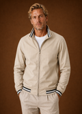 Front view of men's lightweight bomber jacket with zip closure