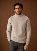 Front view of the Areleon mock neck sweater on a mannequin