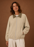 Front view of Areleon Women's Barn Jacket on a mannequin showing zip-front closure and dual chest pockets in beige
