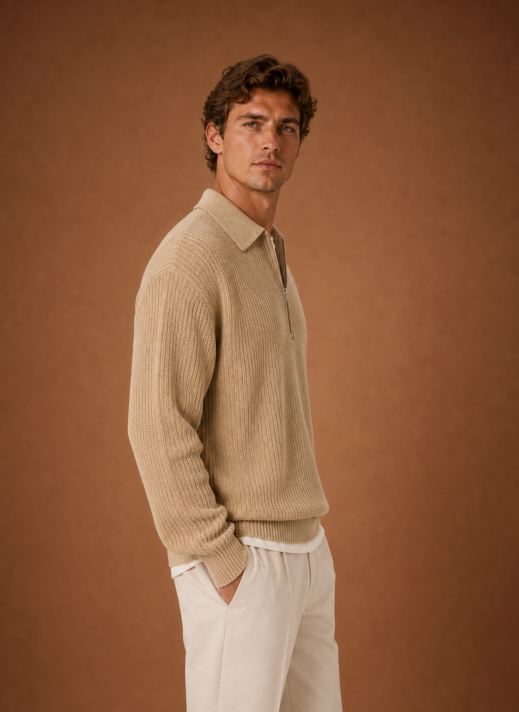 Side profile of the oversized quarter-zip knit sweater showing the relaxed silhouette