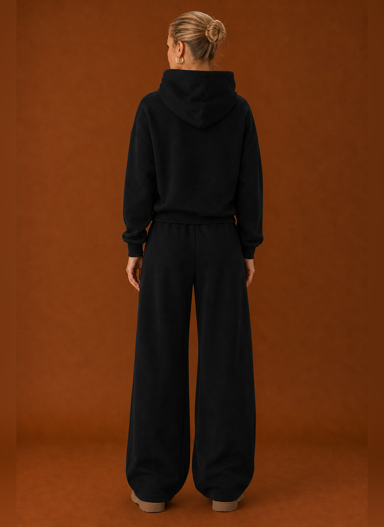 Back view of the matching sweatsuit set showing a clean silhouette