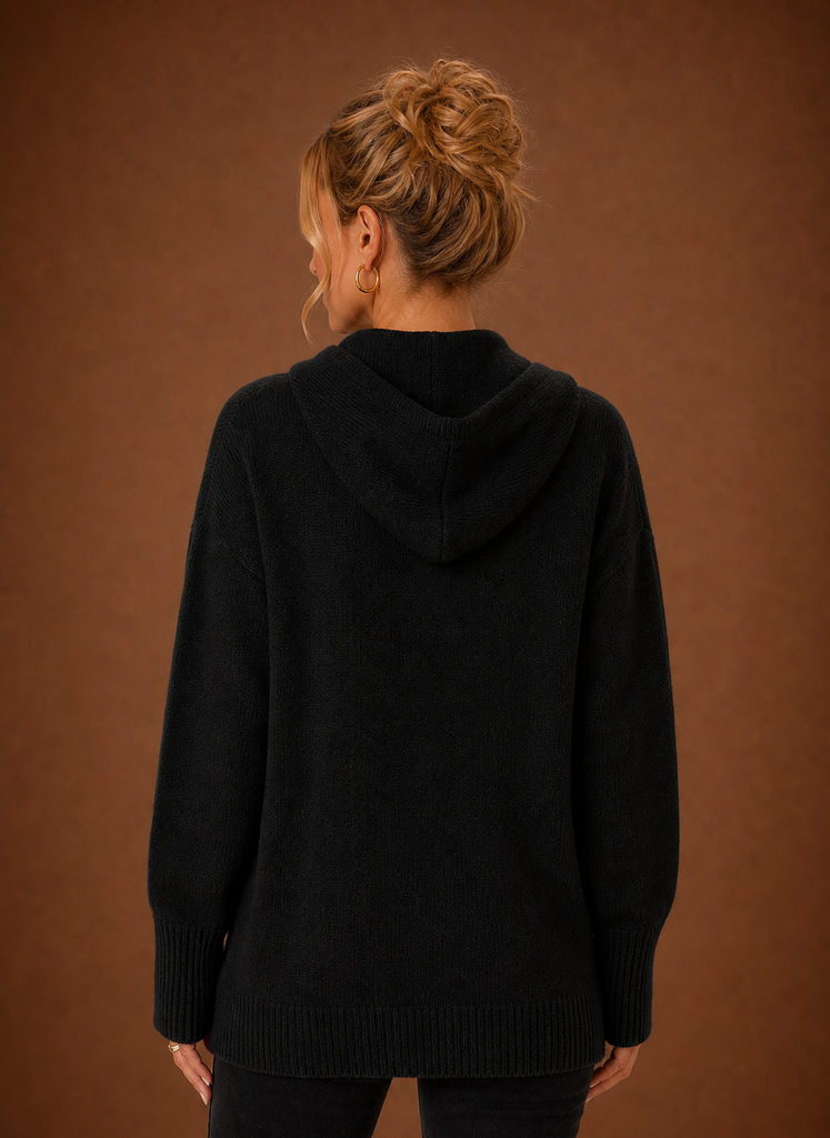 Back view of the cardigan showing full coverage and straight hem