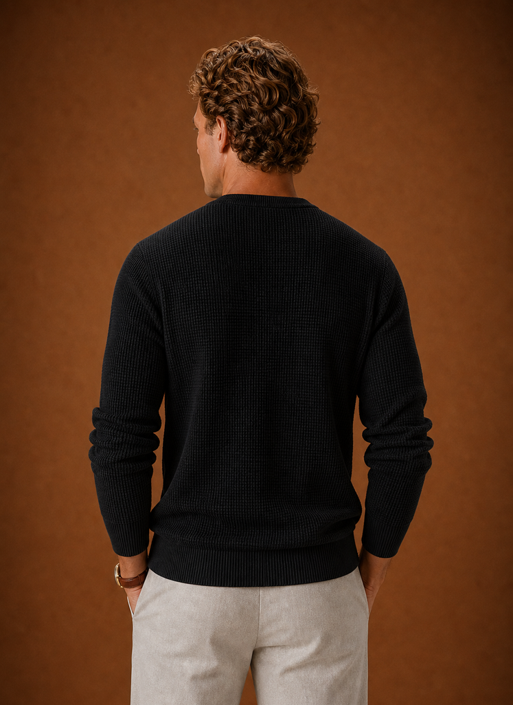 Back view of Areleon men's waffle knit crew neck sweater highlighting straight hem and knit texture