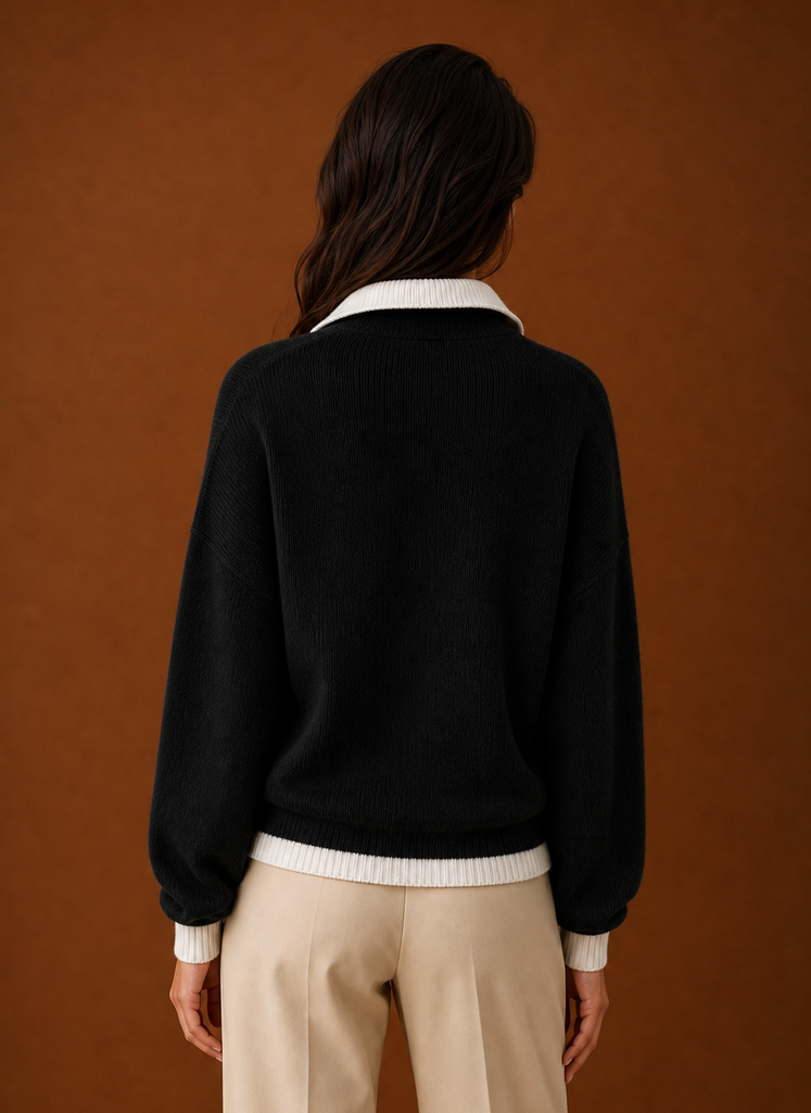 Back view of women's quarter zip sweater with a clean silhouette