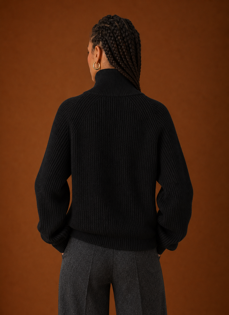 Back view of the quarter-zip knit sweater showing a clean silhouette