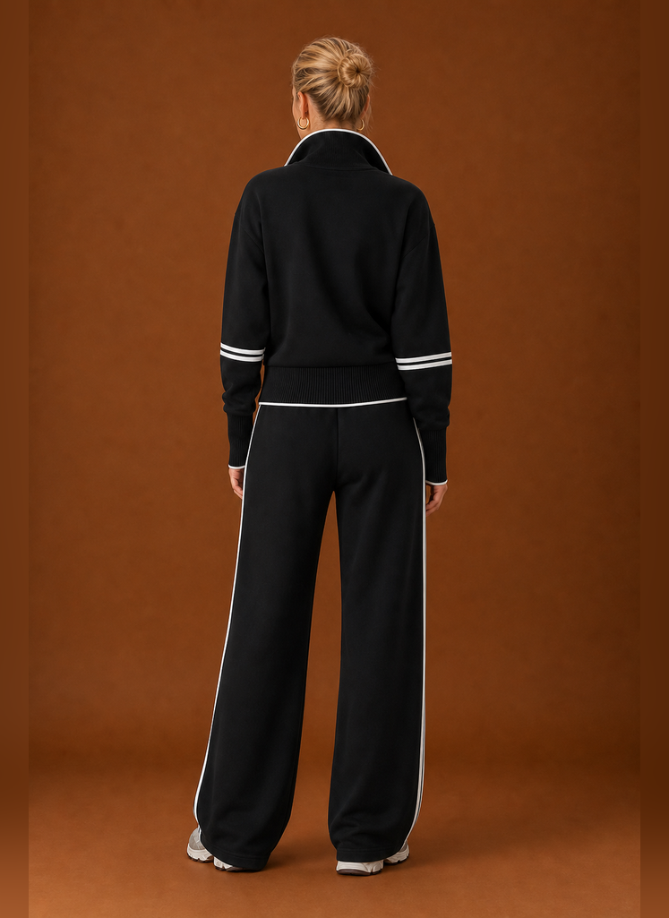 Back view of the tracksuit set showing the sweatshirt and joggers