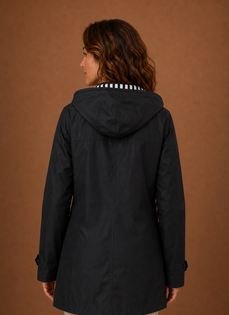 Back view of women's hooded trench coat showing hood and clean back seam