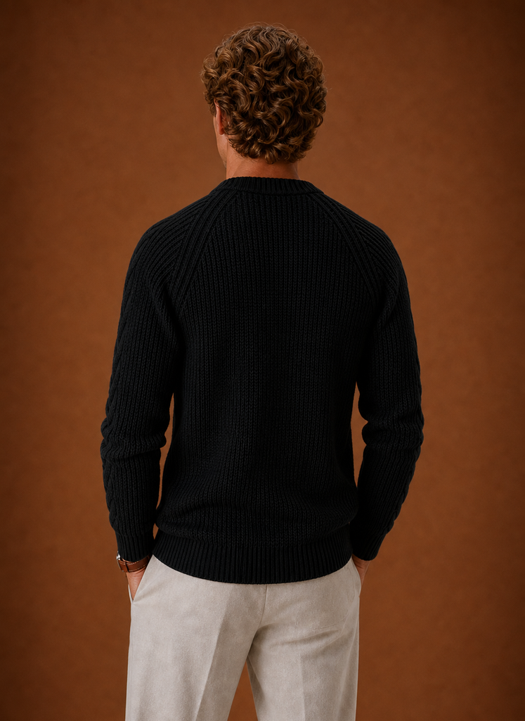Back view of a men's cable knit crewneck sweater in sky blue