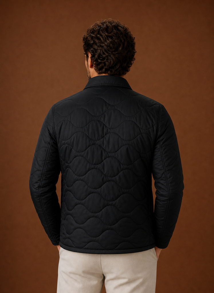 Back view of men's black quilted shirt jacket displaying quilting pattern