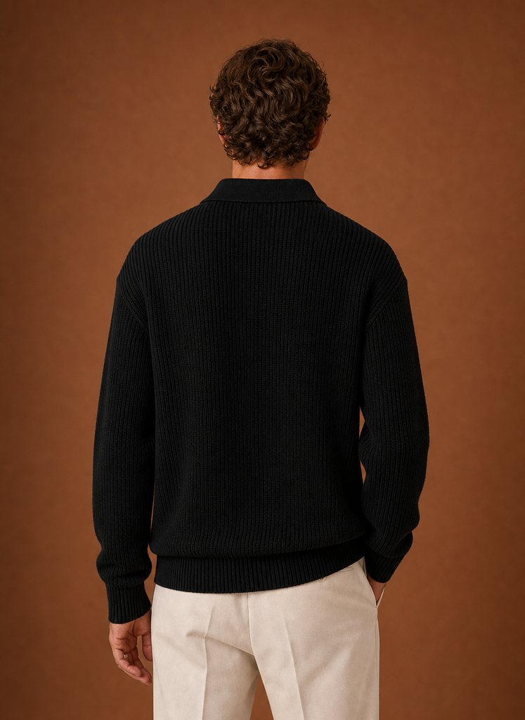 Back view of the oversized quarter-zip knit sweater with a clean knit finish