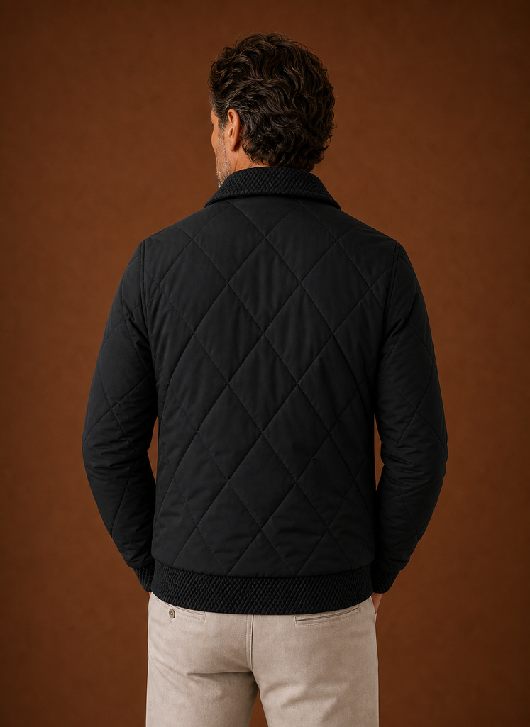 Back view of men's quilted bomber jacket showing quilted pattern