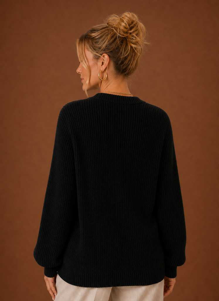 Back view of women's knit cardigan showing clean hemline and fitted shoulders