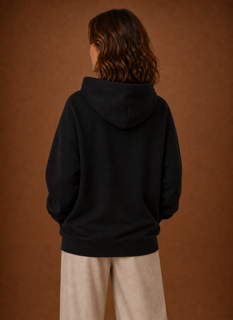Back view of women's oversized hoodie with hood down and plain back
