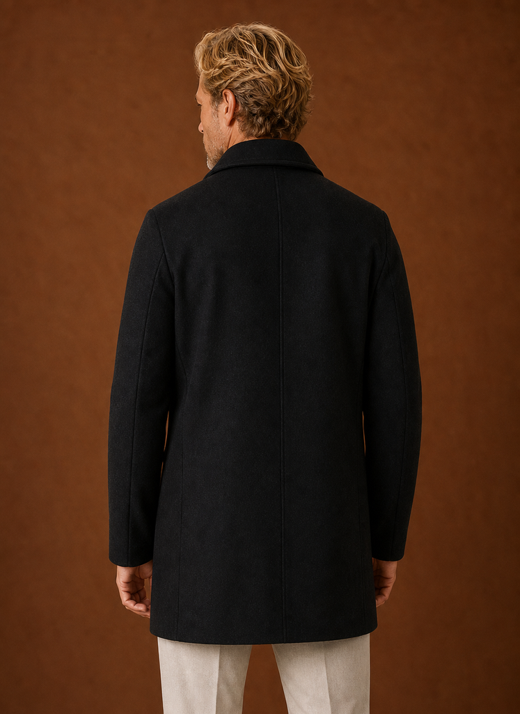 Back view of a men's mid-length overcoat highlighting the streamlined construction