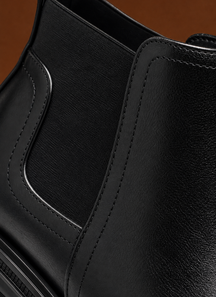 Close-up of elastic side panel and stitching detail on Areleon men's Chelsea boot