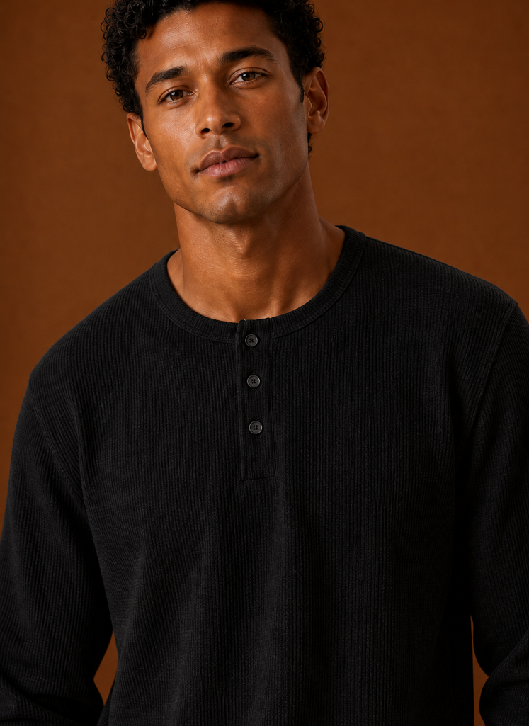 Close-up of waffle knit texture and Henley button placket