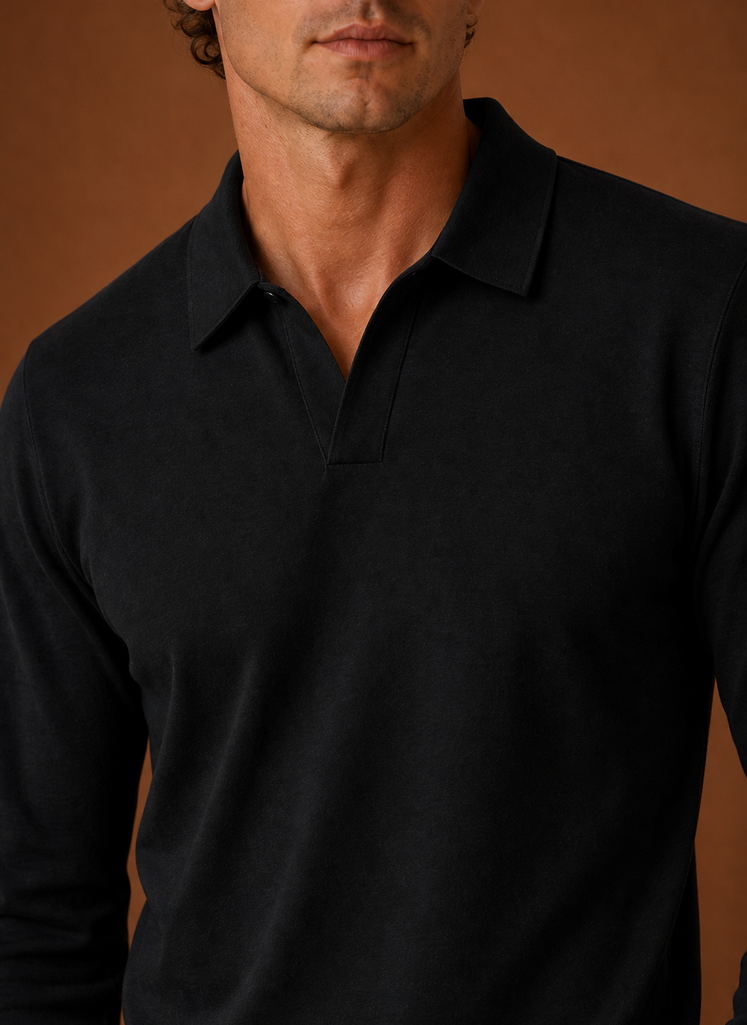 Close-up of button placket and collar detail on men's polo shirt in beige