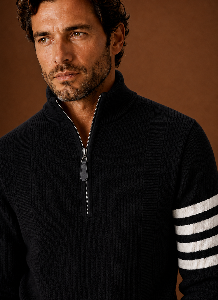 Close-up of the knit texture and half-zip closure with stripe detail