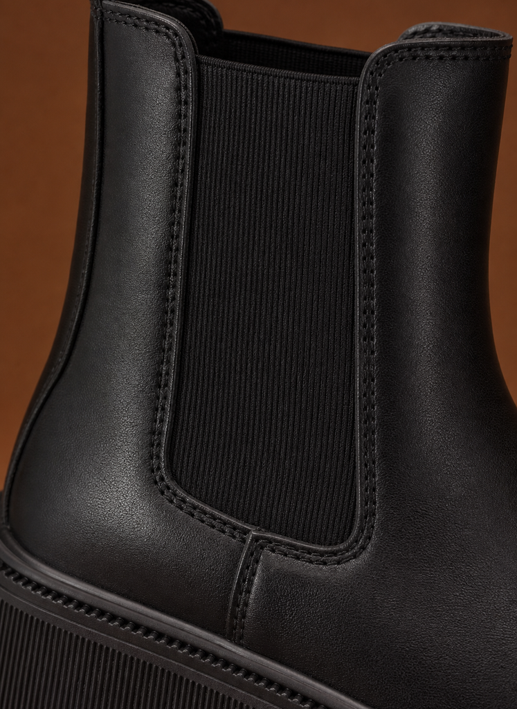 Close-up of lug sole tread and ankle finish on Areleon women's Chelsea boot