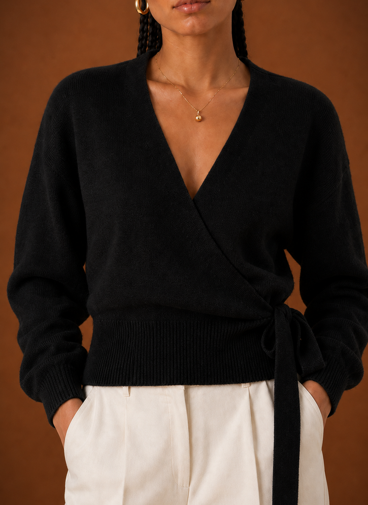 Close-up of the tie waist knot and V-neckline detailing