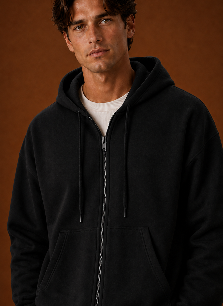 Close-up of the zipper and stitching details on the hoodie