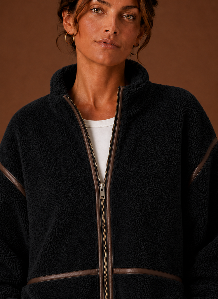Close-up detail of jacket showing texture and pocket stitching