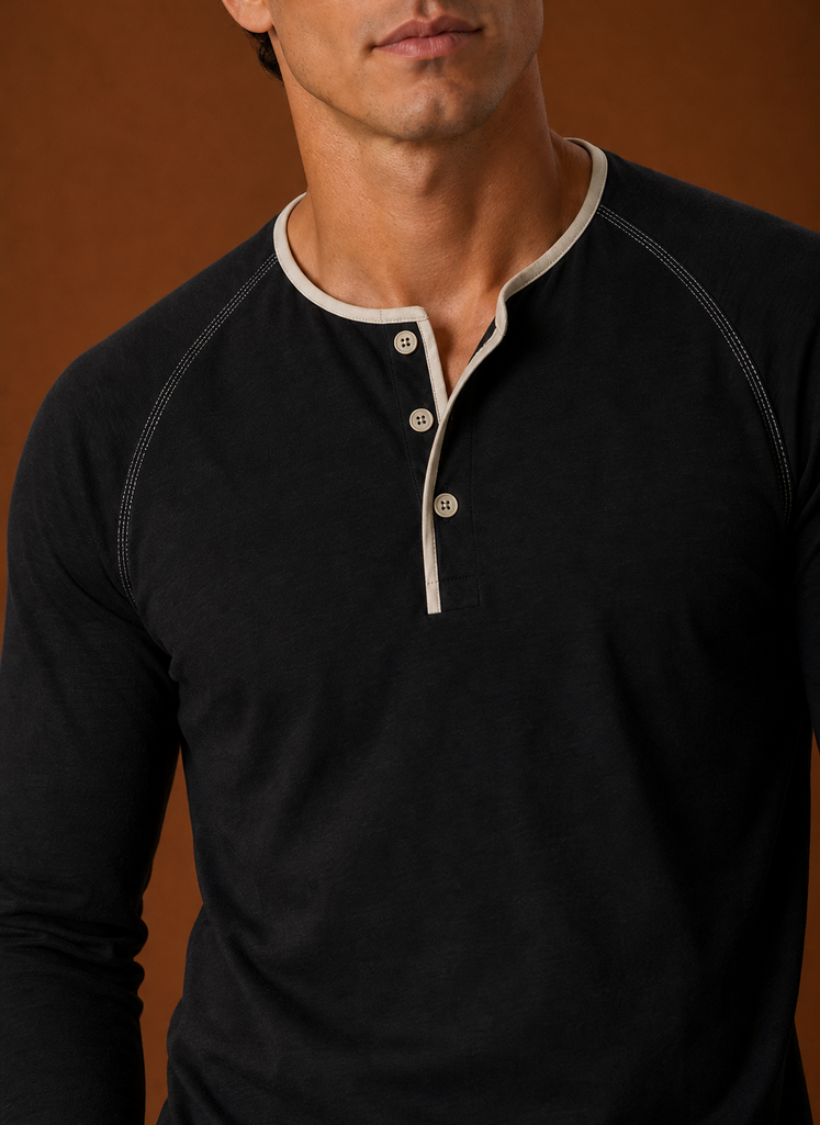 Close-up of the Henley shirt button placket and neckline stitching