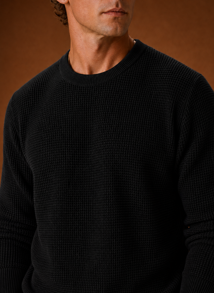 Close-up of waffle knit texture and crew neckline detail on Areleon men's sweater