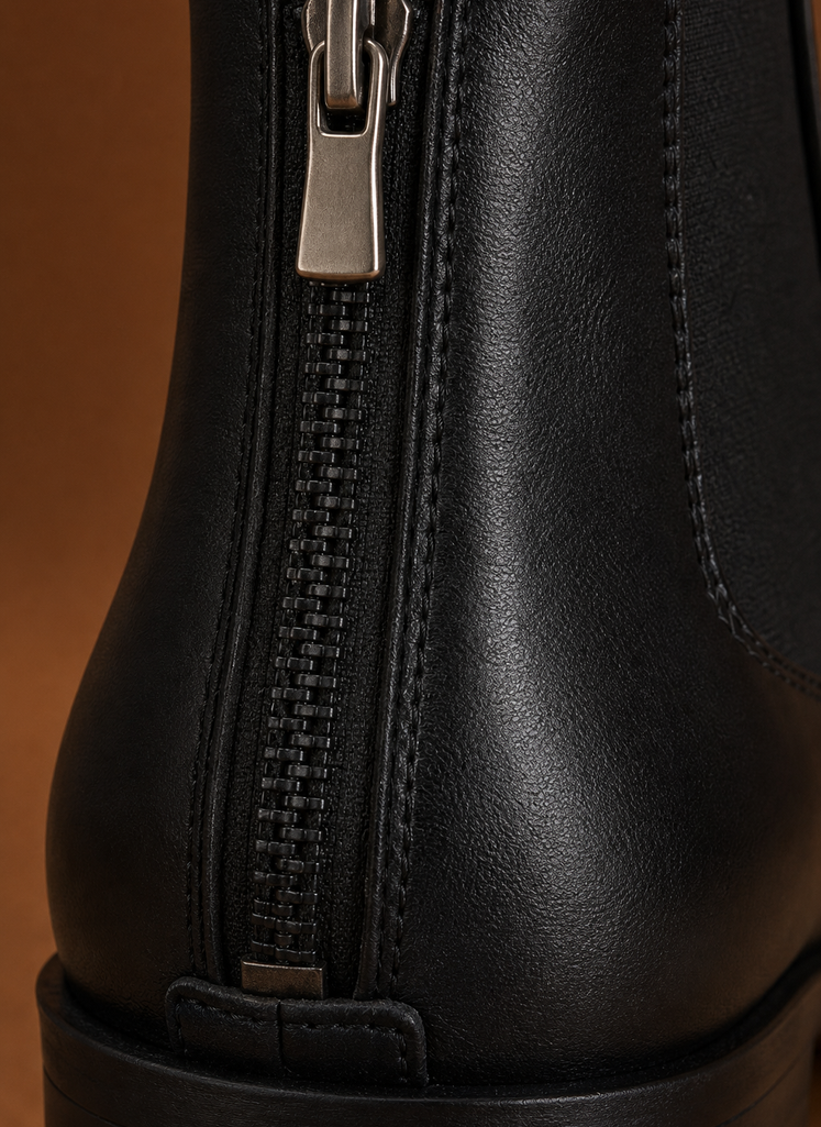 Close-up showing pointed toe and heel details on the women's Chelsea ankle boot
