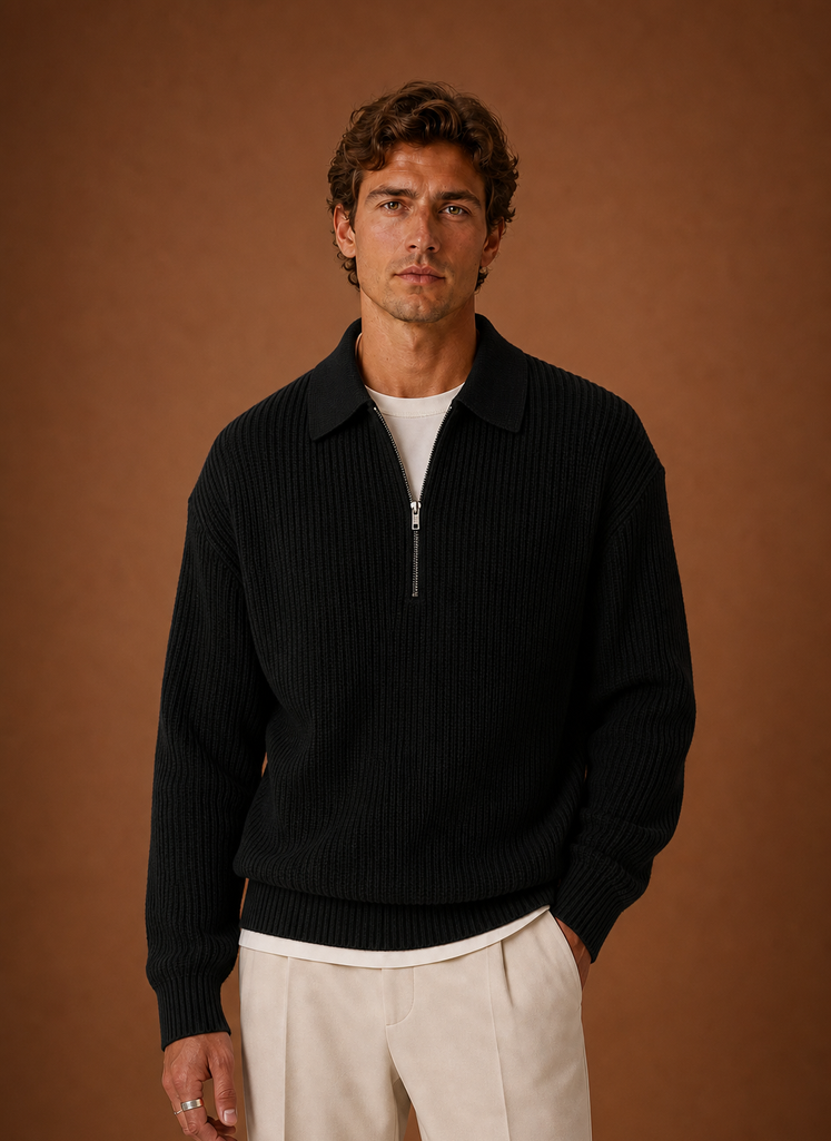 Front view of oversized quarter-zip knit sweater on a neutral background
