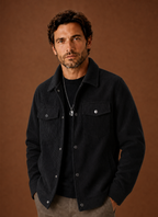 Front view of a men's crew neck knit sweater on a neutral background