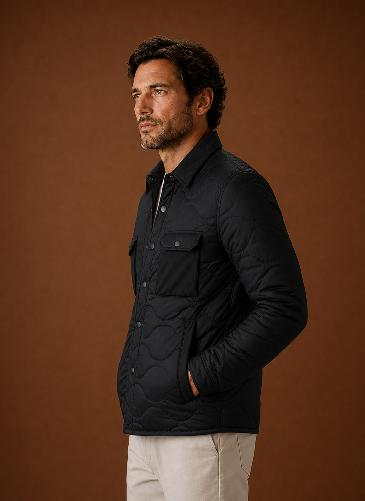 Side view of men's black quilted shirt jacket showing silhouette