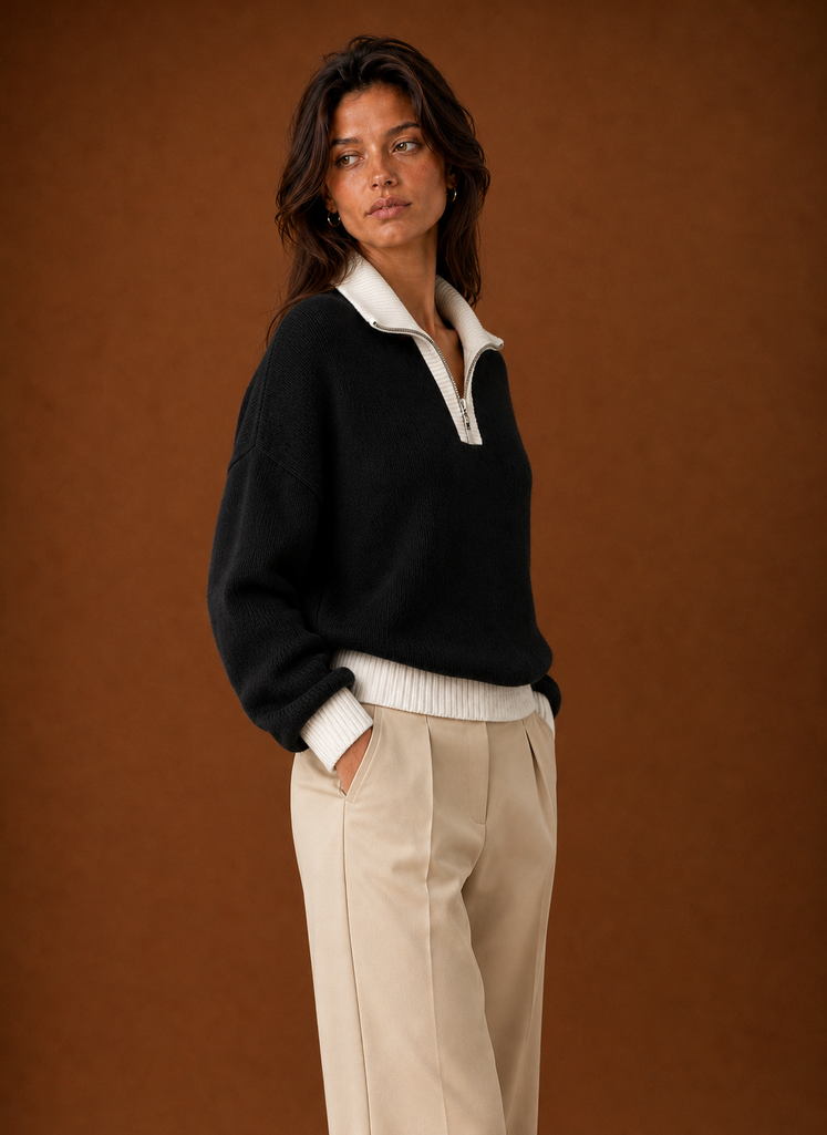 Side view of women's quarter zip sweater highlighting fit and sleeve length