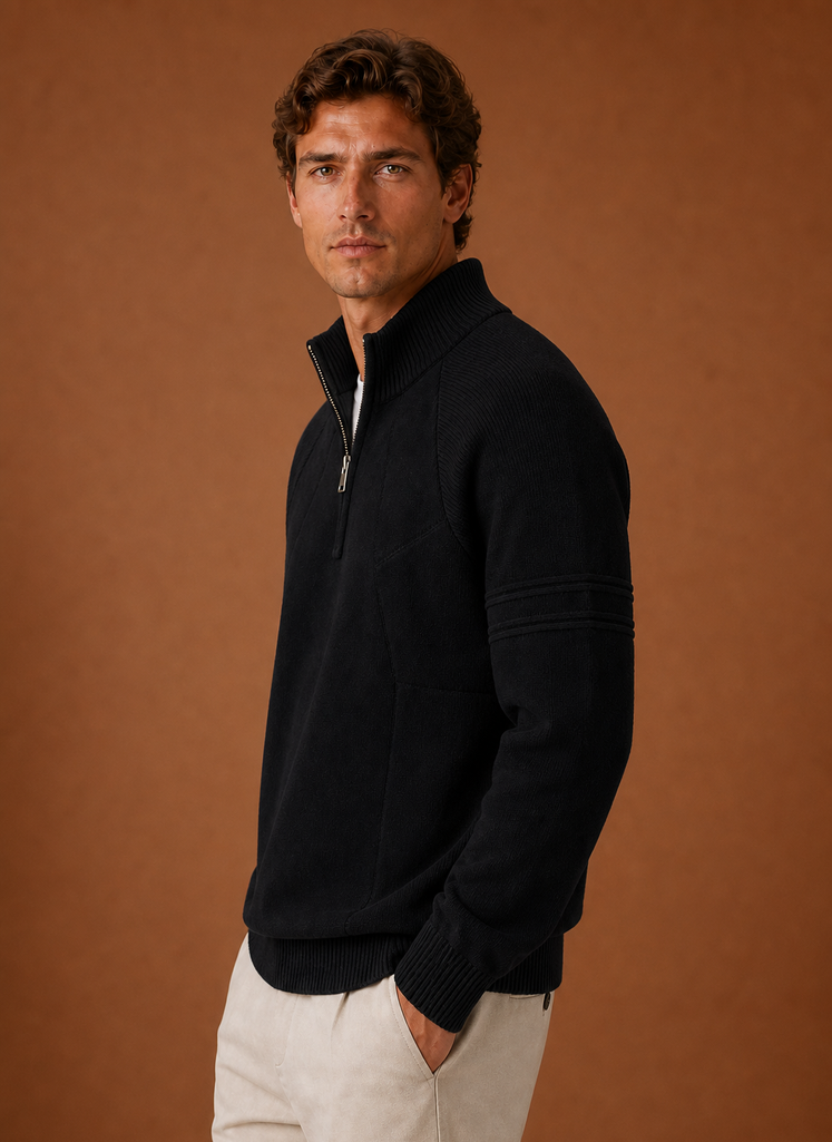 Side profile of men's half-zip knit sweater showing the zip neckline and sleeve