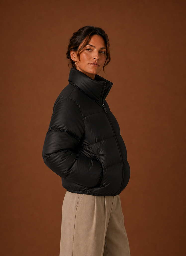 Side profile of Areleon women's puffer jacket in chocolate brown showing the silhouette