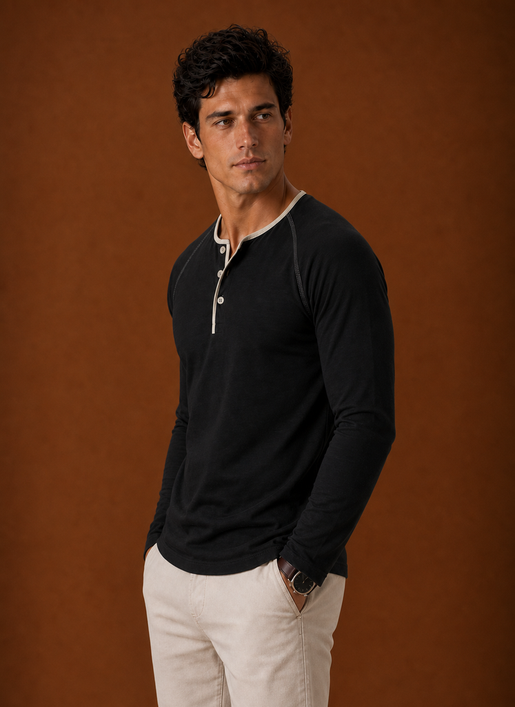 Side view of a men's Henley shirt displaying fit and sleeve line