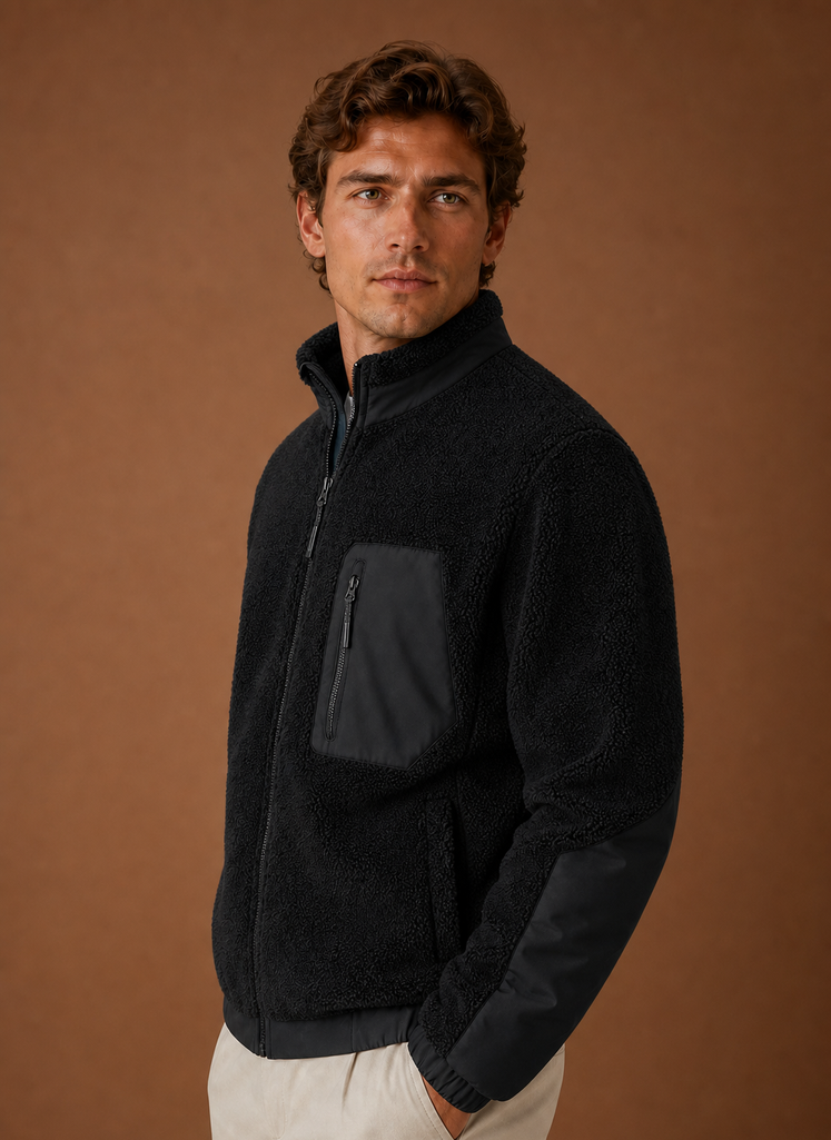 Side profile of men's sherpa jacket showing the silhouette and sleeve shape