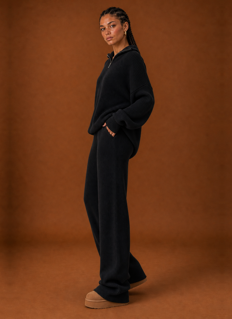 Side profile of the tracksuit set displaying the relaxed silhouette and fit