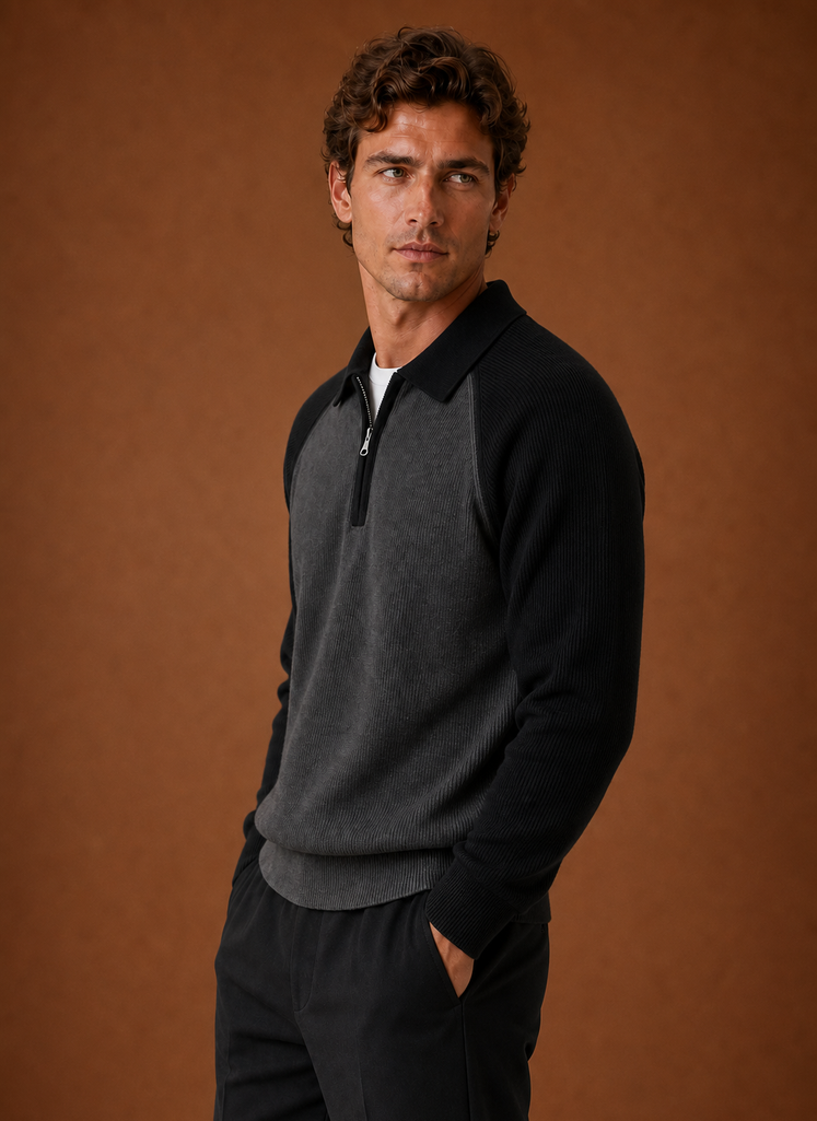 Side profile of men's half-zip knit sweater showing the zip neckline and sleeve fit