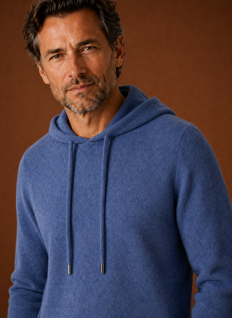 Close-up detail of the knitted texture and hood seam on the Areleon sweater