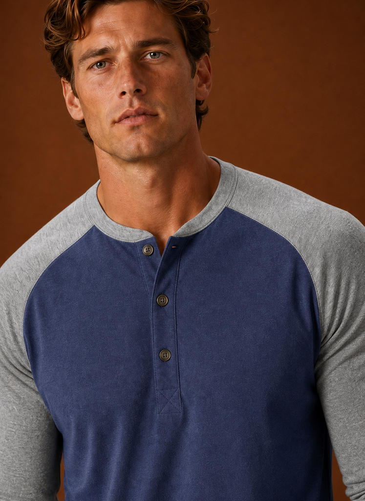 Close-up of the button-placket and neckline detailing on the Henley shirt