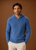 Front view of Areleon men's full-zip knit hoodie on model