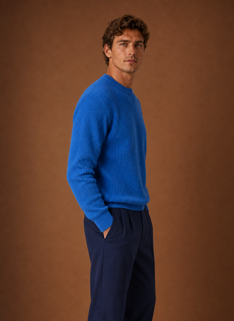 Side profile of men's ribbed crew neck sweater showing sleeve and shoulder fit