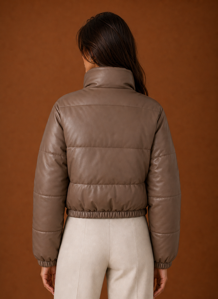 Back view of the women's bomber jacket showing clean lines and straight hem
