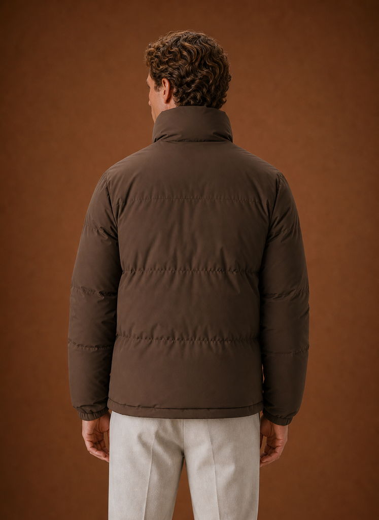 Rear view of the puffer jacket showing the back shape and quilting pattern