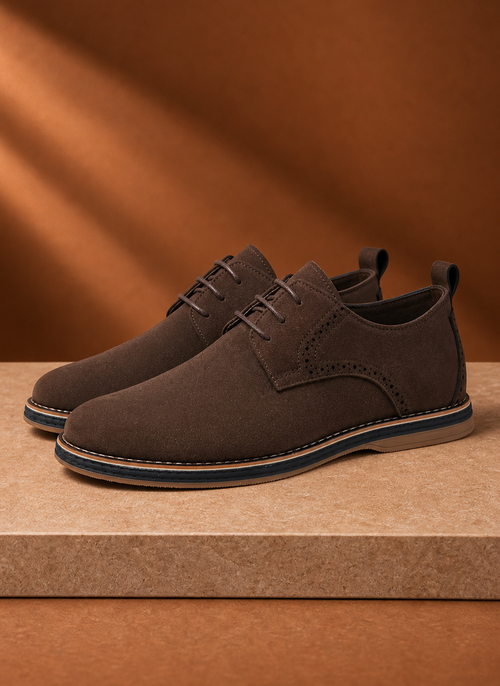 Close-up of the lacing and stitching on the black men's derby dress shoe